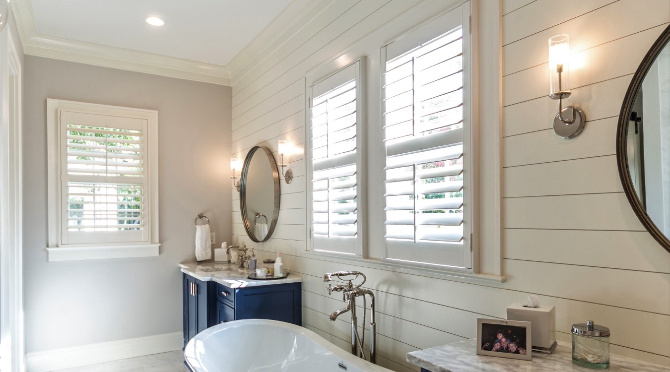 Dover bathroom with white plantation shutters.