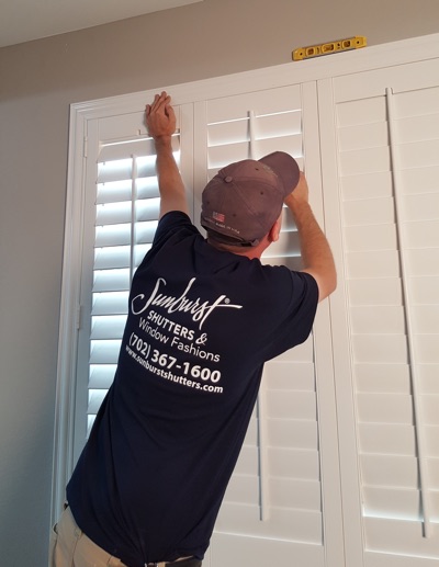 Shutter installation in Dover bedroom.